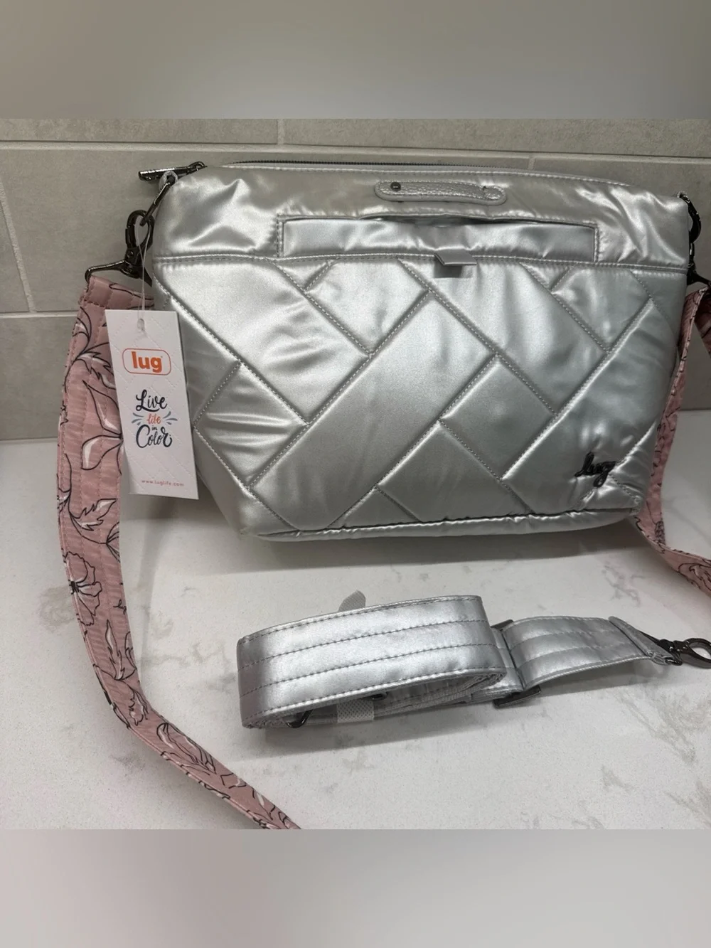 NWT lug Flare Metallic Silver Quilted Crossbody with Pink Floral & silver straps